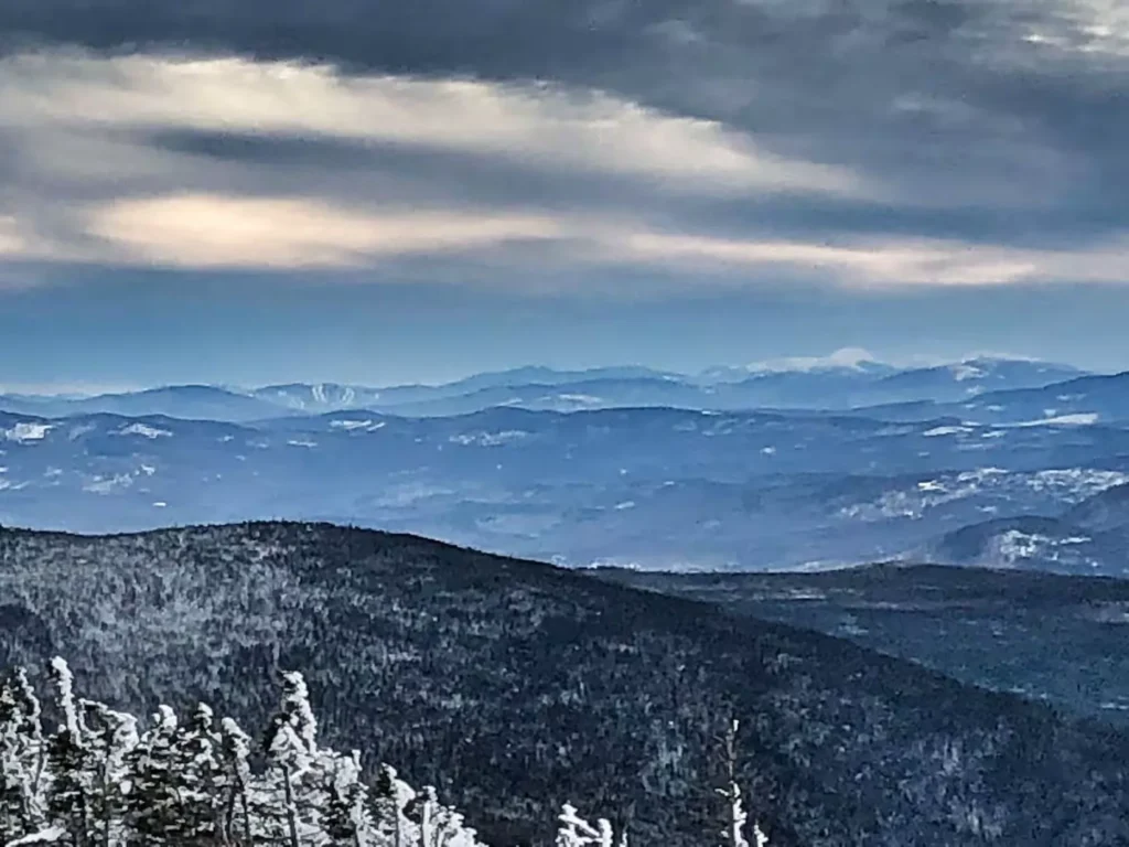 View from Sugarloaf Ski Resort - Mount Washington on the right with Sunday River's trails on the left